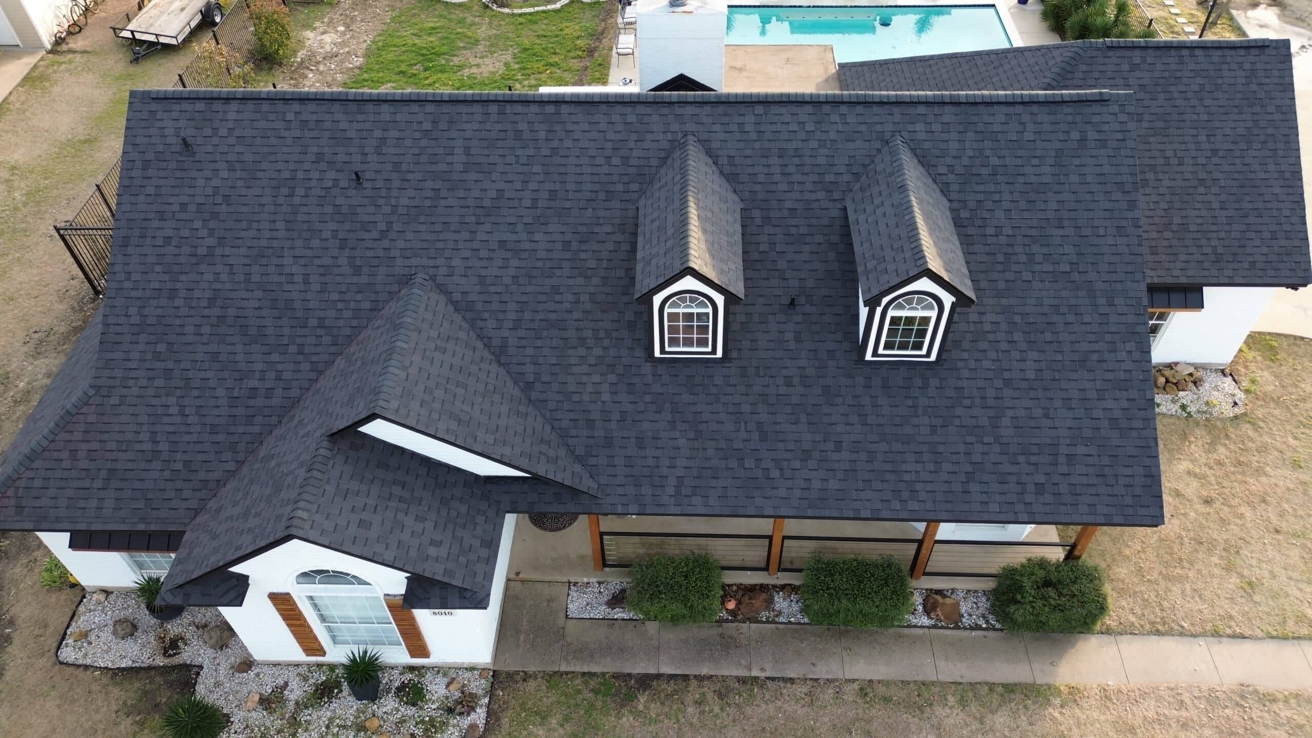 New composition roof with ridge cap detail