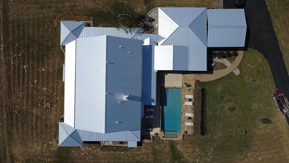 Metal roof installation drone shot