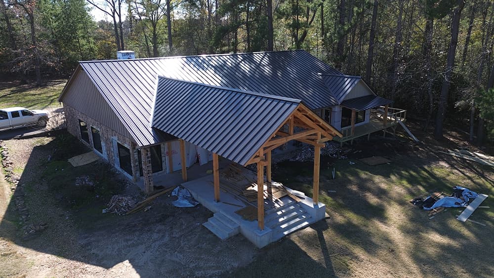 Standing seam roof with ridge cap detail